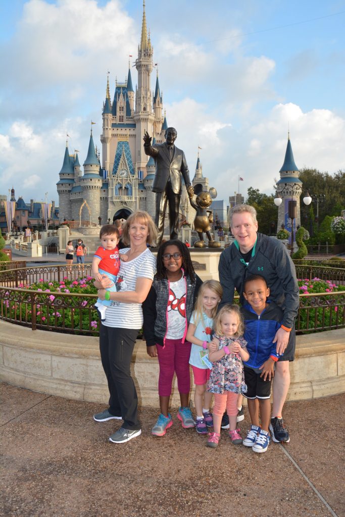 family in front of castle