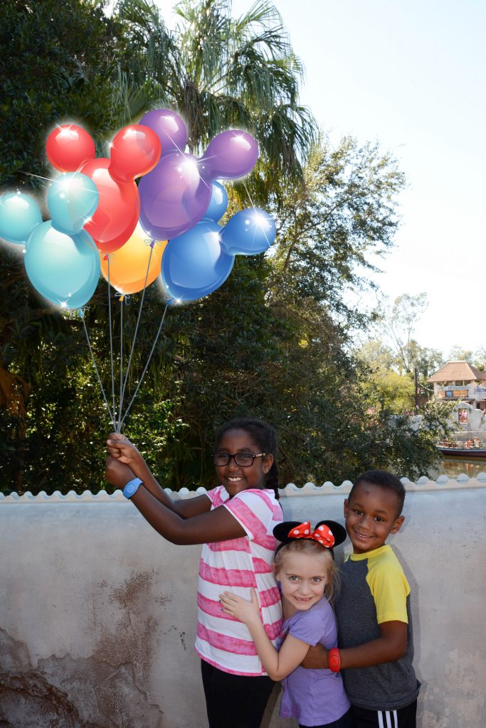 Kids with Mickey balloons
