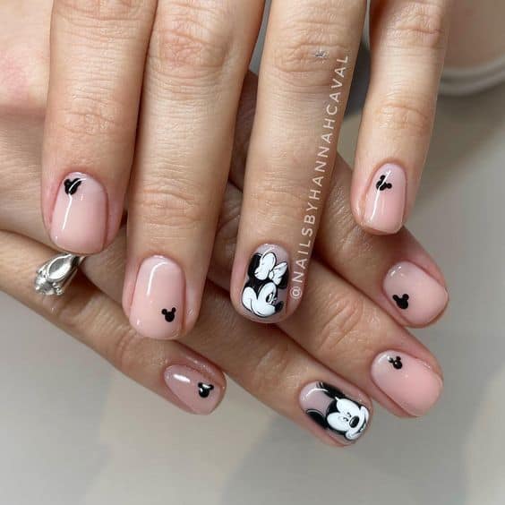 neutral nails with mickey faces