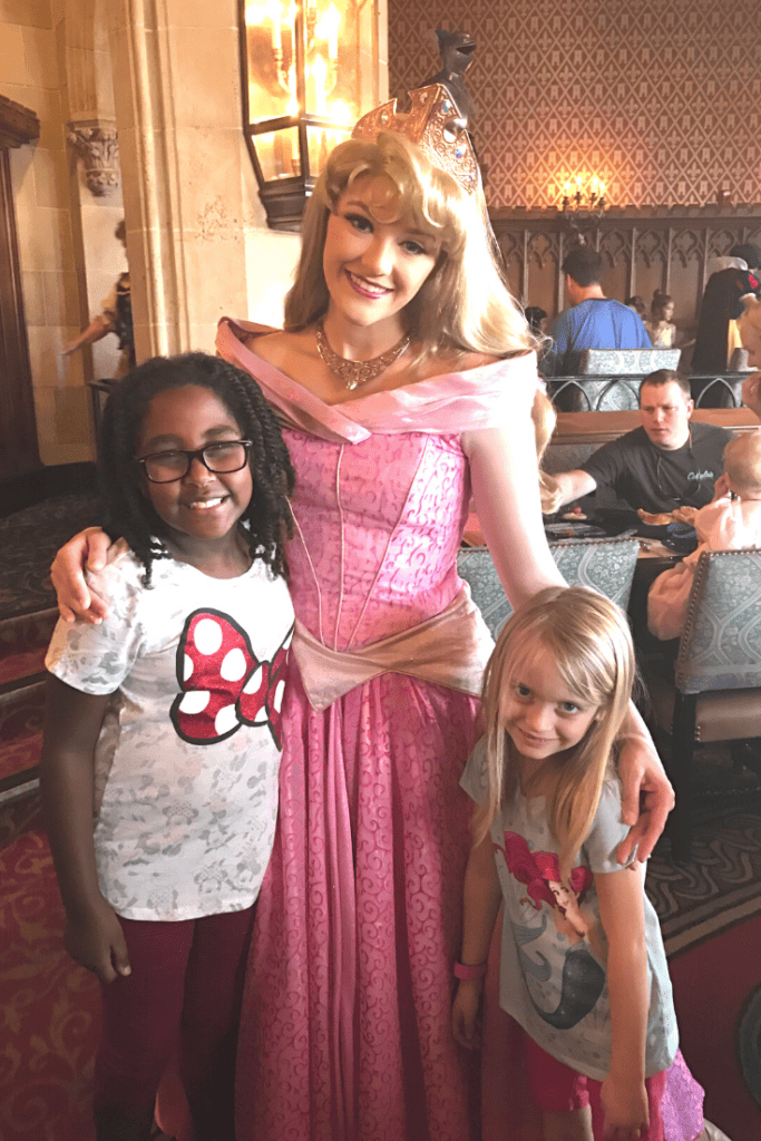 Girls with Princess Aurora Disney World