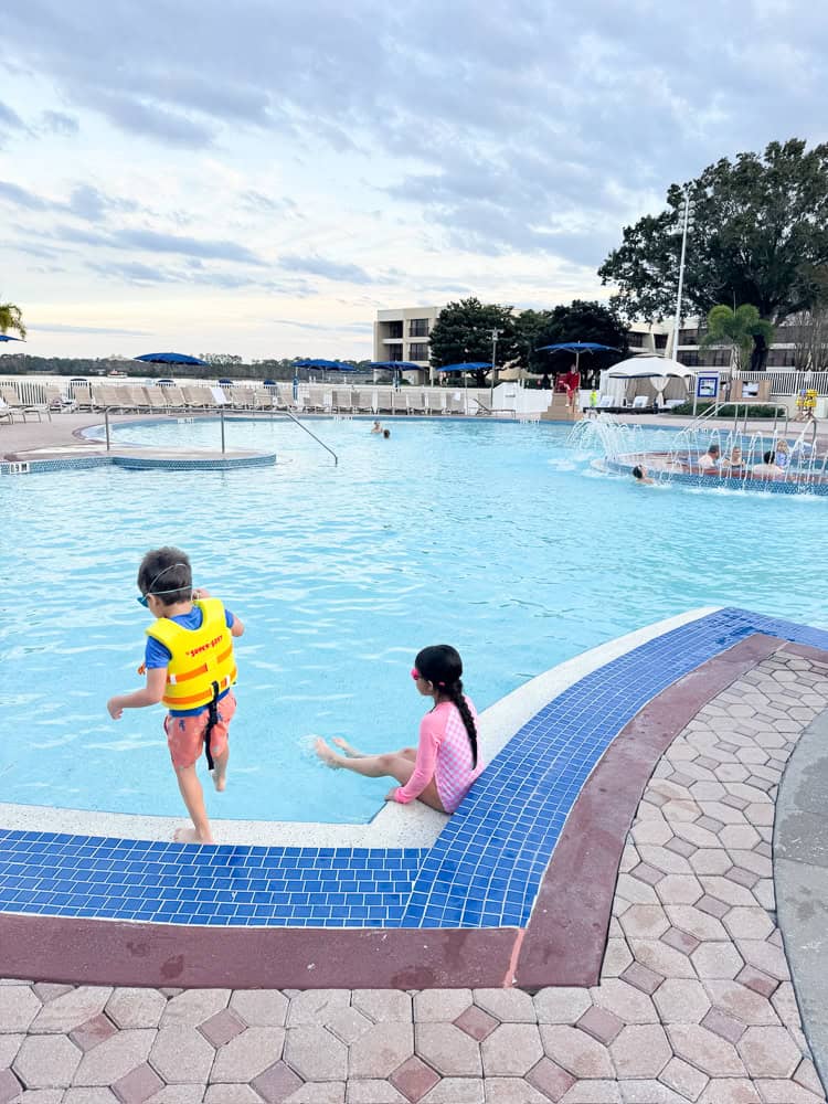 2 kids at Disney pool