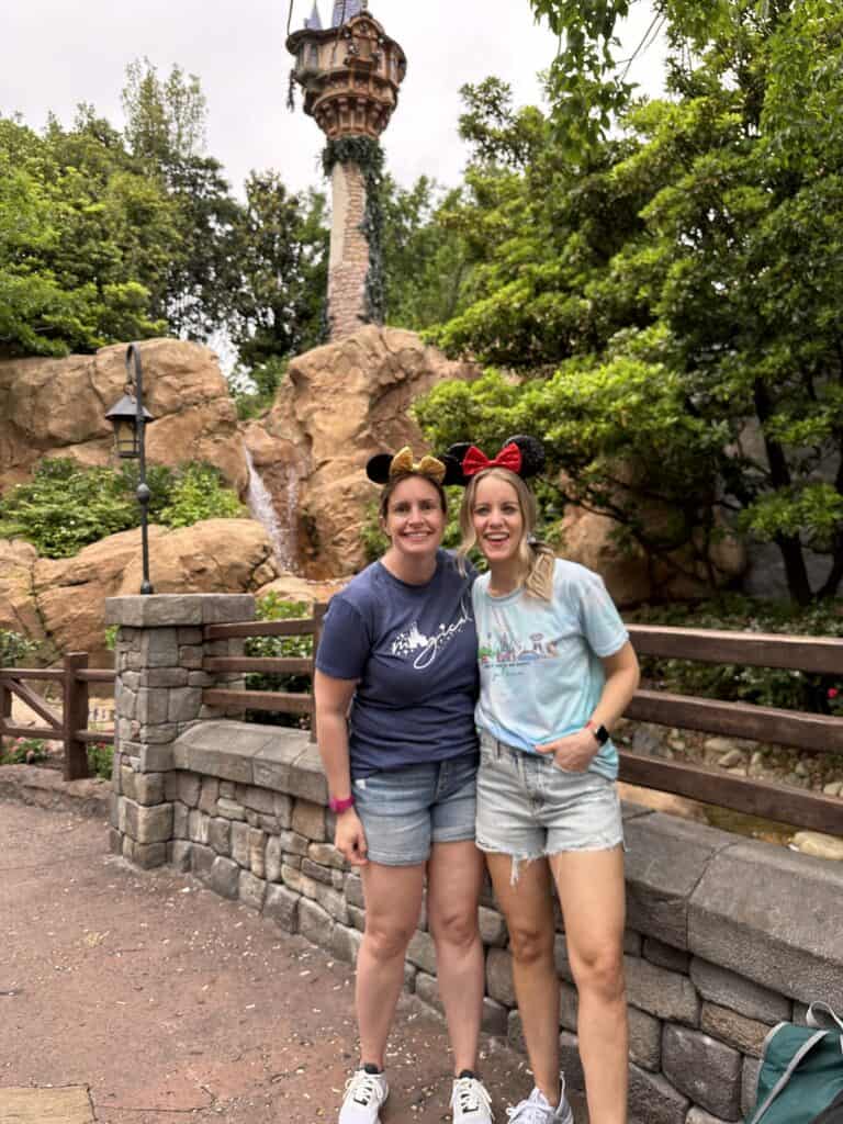 Women in front of Rapunzel's tower