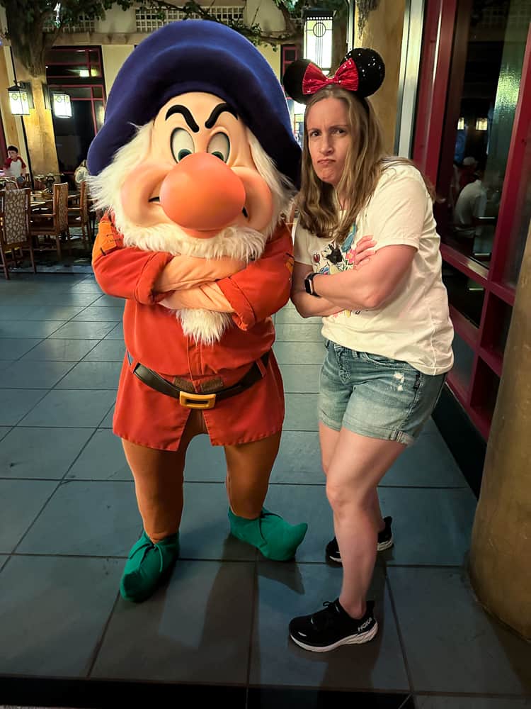 grumpy dwarf and a woman looking grumpy