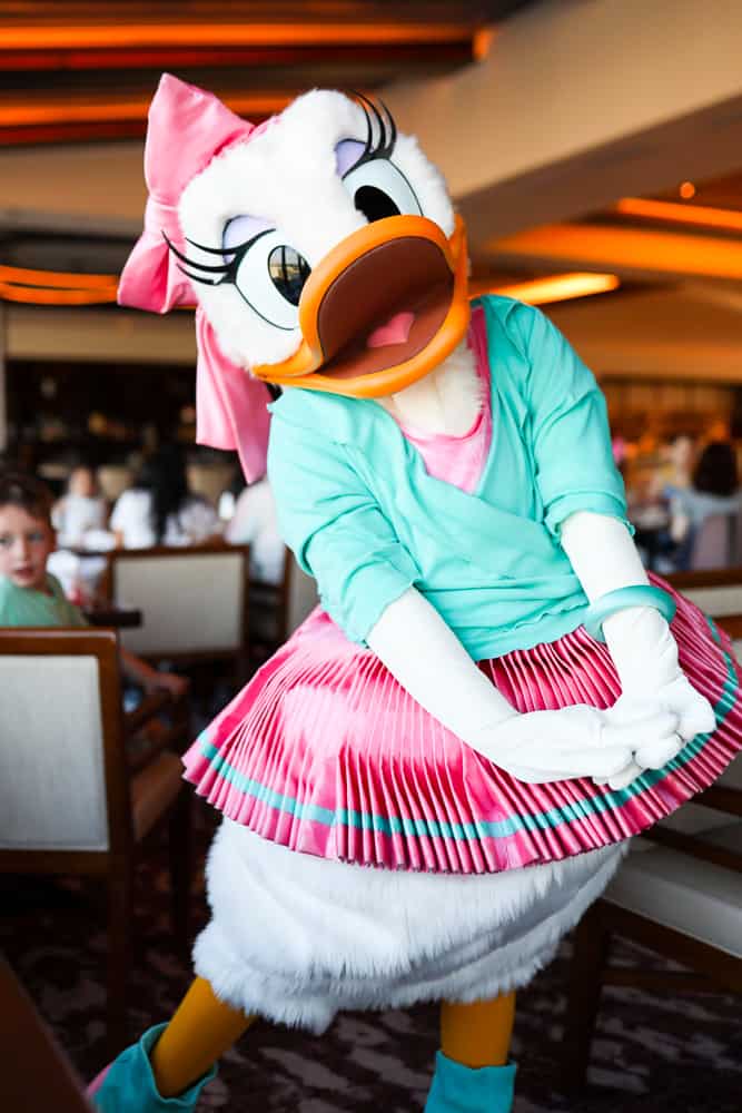 Topolino's character dining Daisy Duck