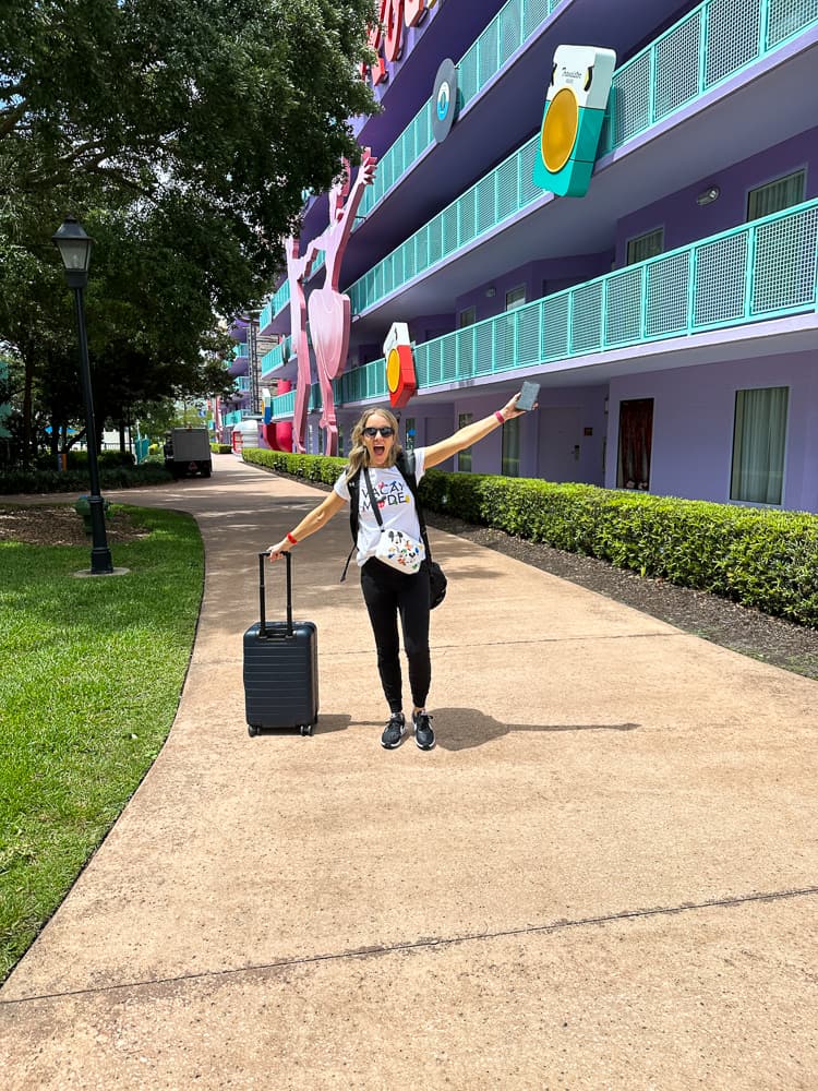 woman arriving at POP Century Resort