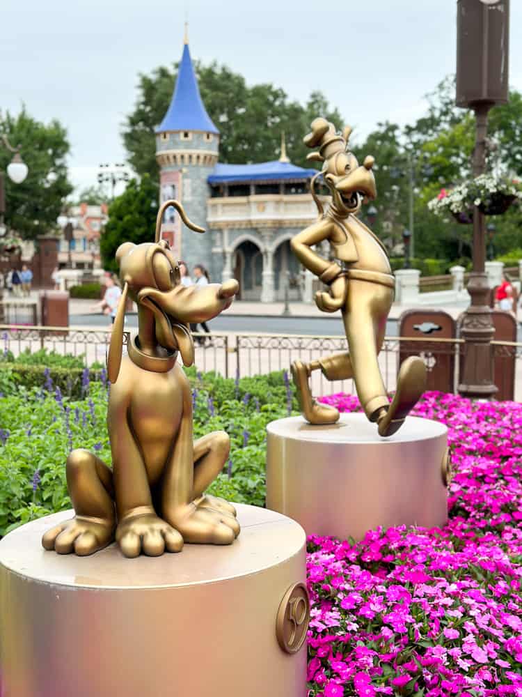 Pluto and Goofy golden statues