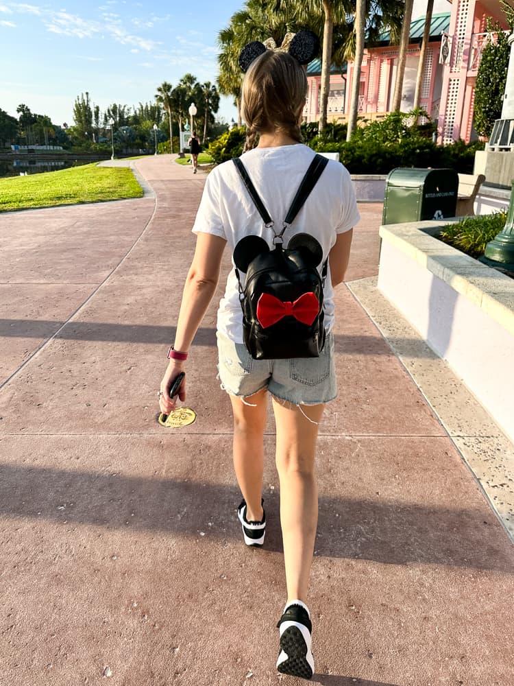 woman in minnie mouse backpack