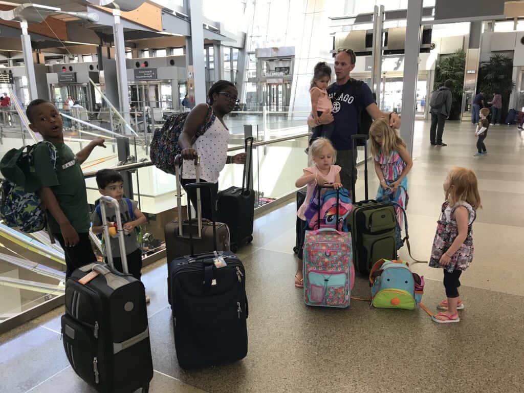 family with kids at the airport