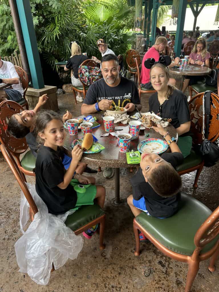 Family eating at Flame Tree BBQ at Disney's Animal Kingdom